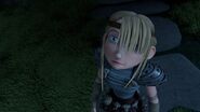 Astrid watching Hiccup and Toothless fly away