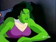 She-Hulk looking up at Dr. Doom’s Doombots pointing their weapons at her