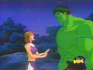 Jennifer meets the Hulk for the first time and convinces him that she is his family