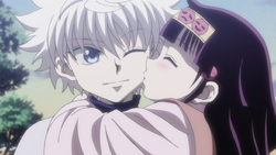 Alluka kissing Killua on the cheek