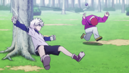 Killua hitting Sub with his yo-yos