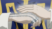 Kurapika cadenas en su mano