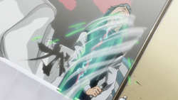 A close up of Leorio punching Ging