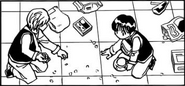 Kurapika and Pairo pick up Pairo's money that the offenders spilled