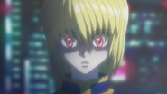 Kurapika activates his Scarlet Eyes