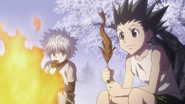 Gon and Killua listening to Kite's story