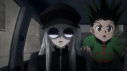 Gon with dressed Kurapika waiting for Troupe