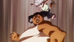 Killua about to pour liquor on Bopobo