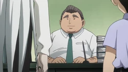 Won sitting at his desk in front of Kite and Lin