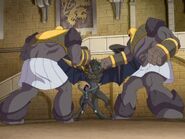 Zhalia and King Basilisk hold off the two Undergolem Titans