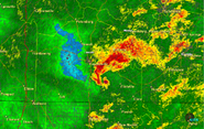 The EF3 tornado on radar with a clear hook echo.