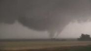 The wide EF3 entering southern Houston