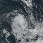 Disorganized Dawson late on August 7th, as a minimal 100 mph major hurricane, while it was in its weakening phase, showing a completely collapsed structure and disorganized convection, with its strong northern band now almost completely missing.