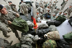 Members of the New York and New Jersey National Guard distributing supplies in preparation for the storm.