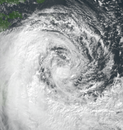 Kelly, now a hurricane, showing its unusual structure, late on October 17th, as preparations and precautions were taken in southern Waleston.