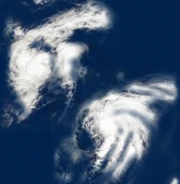 Tropical storms Dawson and Eshin in a Fujiwhara interaction at their respective peak intensities on December 4.