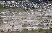 High end EF4 damage to one cluster of homes.