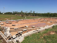 High-end EF3 damage to a poorly-built home in Olney.