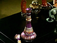 Jeannie's Bottle with purple on the inside of the top