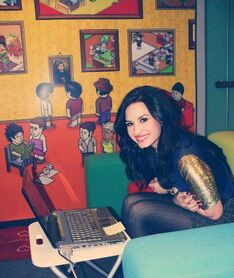 Demi is like me, too! Always on the laptop! XD