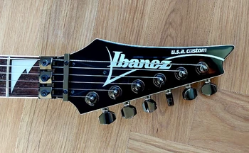 UCMD Golden Feline headstock