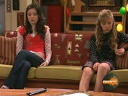 Carly and Sam sit noticeably farther apart due to their argument