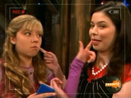 Carly and Sam poke each other in the face on iCarly