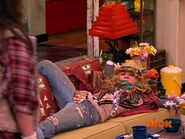 Sam flops onto Carly's couch and closes her eyes