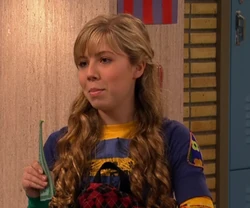 Sam holding mini-golf coupons.