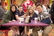 at a Groovy Smoothie table with Freddie, Sam, and Gibby