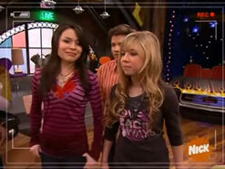 Carly and Sam casually step in front of Freddie after he makes a fool of himself on TV