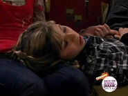 Sam with her head on Carly's lap.
