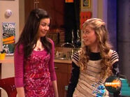 Carly and Sam share an amused look when Freddie and Mrs. Benson enter