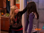 Sam patting Carly on the head. "Yeah, that's my girl."