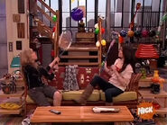 Sam and Carly playing together on the couch despite proximity