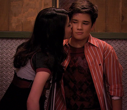 Carly kisses Freddie goodnight.