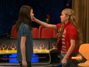 Sam fixing Carly's hair prior to iCarly going on the air