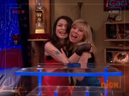 Carly and Sam hugging while repeating "Peanuts!"