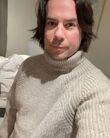 Jerry Trainor in a white sweater Jan 15, 2021