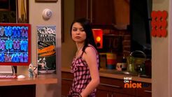 Carly's look at Freddie as she checks the air conditioning unit