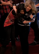 Carly and Sam hug.