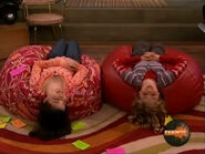 Carly physically turns her head to smile towards Sam so she can see it