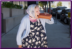 Old lady biting a brick