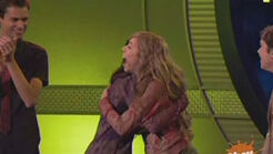 Carly and Sam hug after iCarly is announced the winner