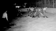 11Dec1937-Habs-NYA.jpg (31 KB) Goalie Earl Robertson defends against #15 Joffre Desilets, Canadiens vs NY Americans, December 11, 1937.