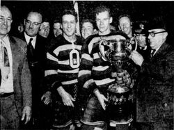 Senators' captain Bobby Copp is presented with the Allan Cup.