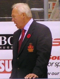 Cournoyer behind the bench