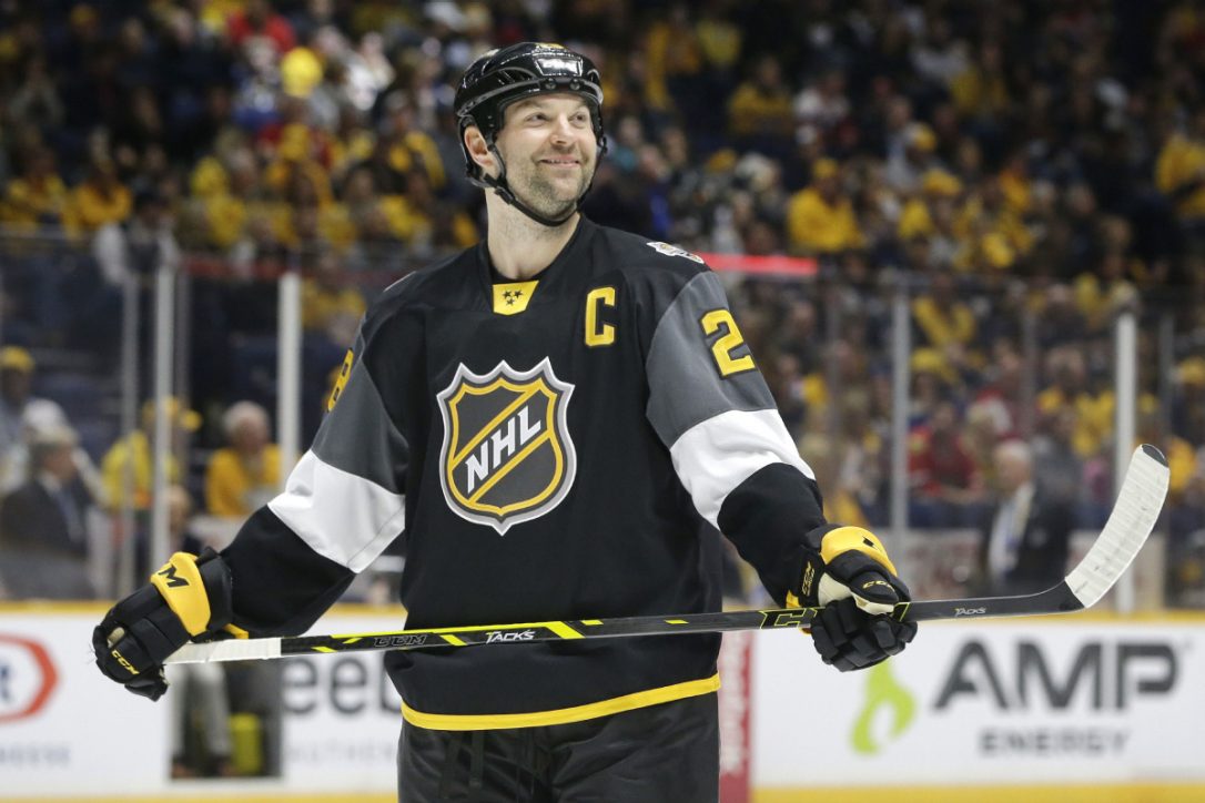 John Scott of the San Jose Sharks takes part in the family skate