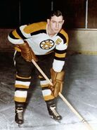 Captain Milt Schmidt wears the first "Spoked B" Bruins jersey in 1948.