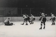 Earl Robertson stops a shot against the Black Hawks in 1938-39 season action.